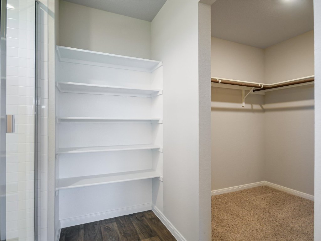 14408 Boquist Drive Pflugerville, TX 78660 - Photo 11 of 20 a view of an empty walk in closet