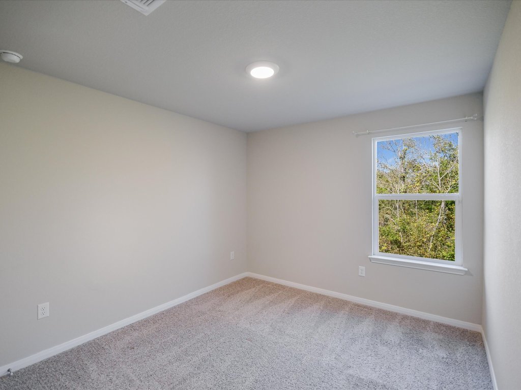 14408 Boquist Drive Pflugerville, TX 78660 - Photo 13 of 20 an empty room with a window