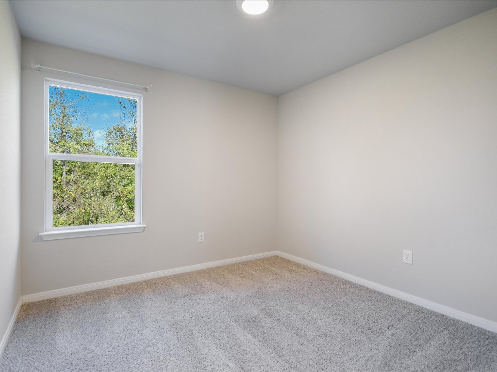 14408 Boquist Drive Pflugerville, TX 78660 - Photo 15 of 20 an empty room with a window