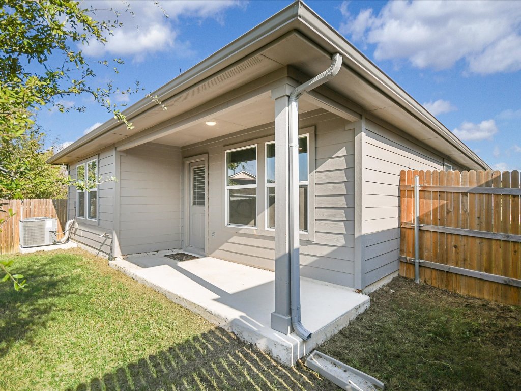 14408 Boquist Drive Pflugerville, TX 78660 - Photo 16 of 20 a front view of a house with a yard