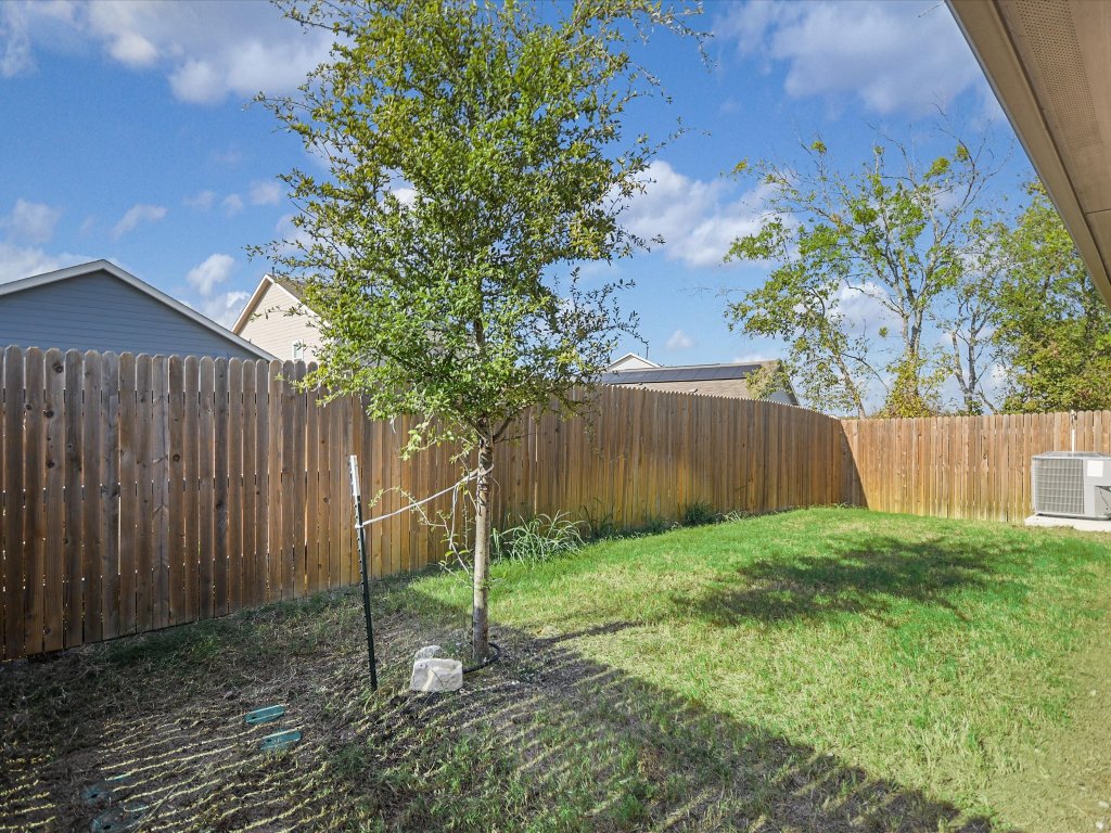 14408 Boquist Drive Pflugerville, TX 78660 - Photo 18 of 20 a backyard of a house