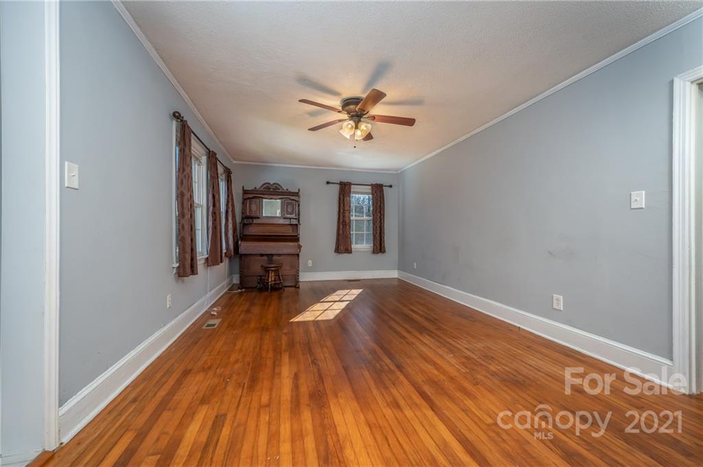 291 Cardinal Street Inman, SC 29349 - Photo 11 of 40 wooden floor in an empty room with a window