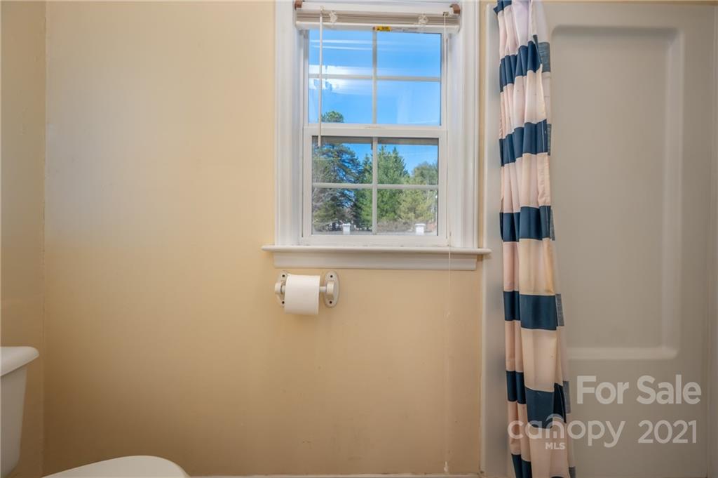 291 Cardinal Street Inman, SC 29349 - Photo 21 of 40 a bathroom with a window and a shower