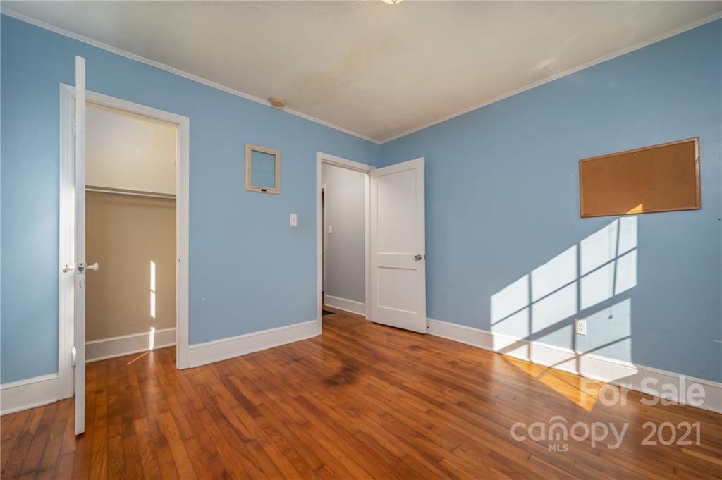 291 Cardinal Street Inman, SC 29349 - Photo 23 of 40 a view of a room with wooden floor and a cabinet