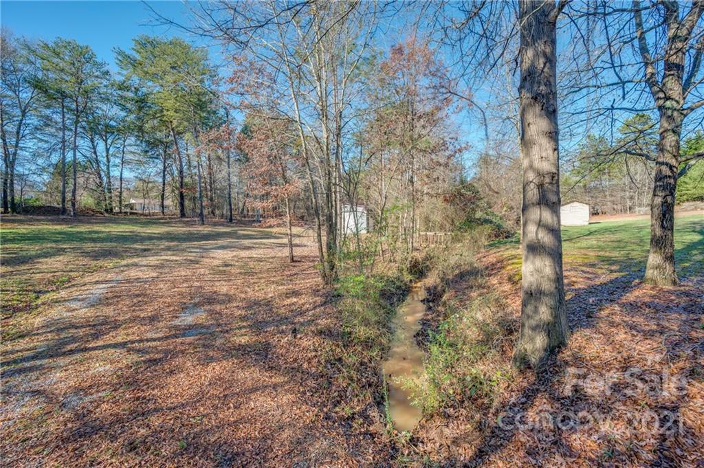 291 Cardinal Street Inman, SC 29349 - Photo 27 of 40 a view of a yard with large trees