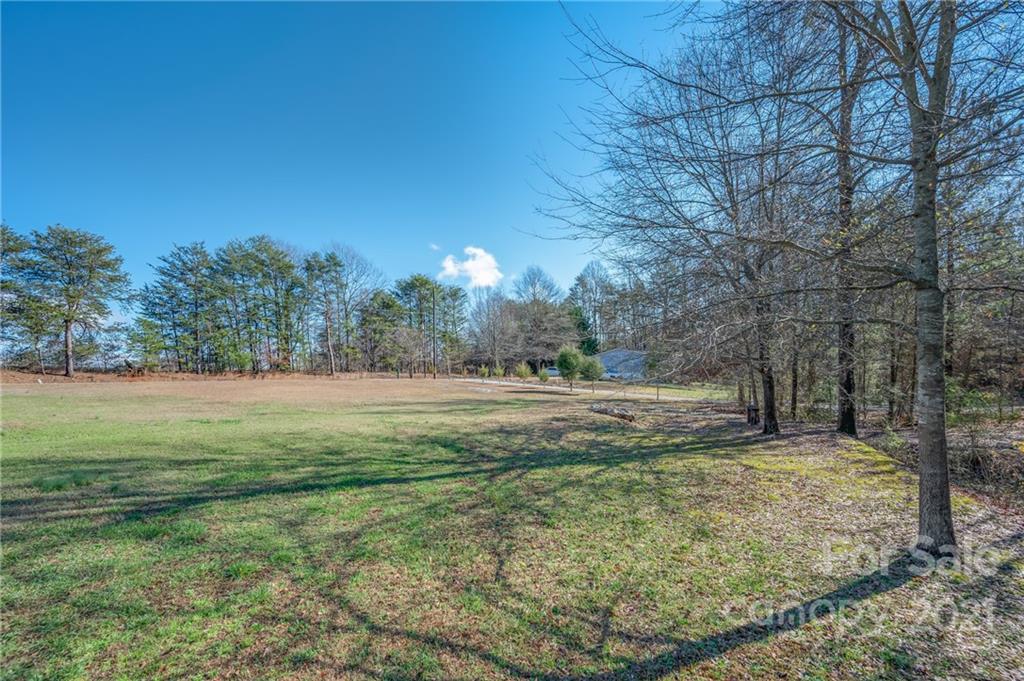 291 Cardinal Street Inman, SC 29349 - Photo 36 of 40 a view of outdoor space with trees all around