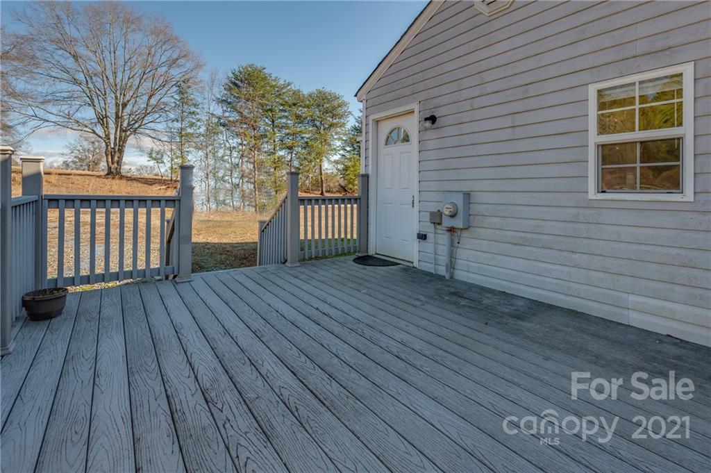 291 Cardinal Street Inman, SC 29349 - Photo 8 of 40 a view of livingroom with deck and wooden floor