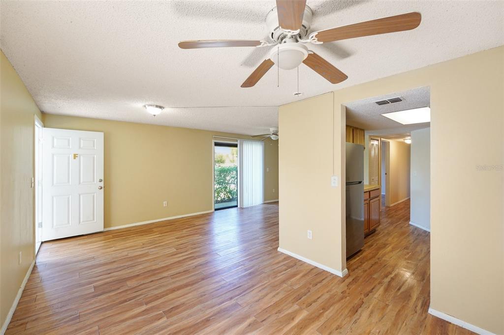 129 Camphor Circle, Unit F Oldsmar, FL 34677 - Photo 7 of 38 wooden floor in an empty room with a window