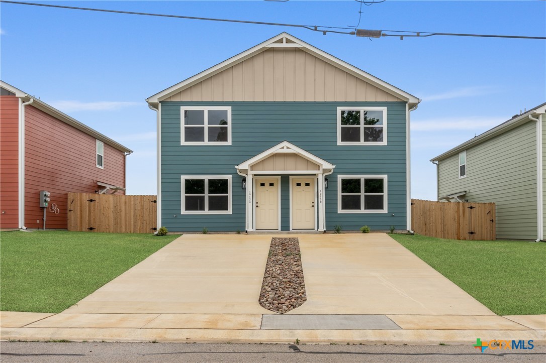 905 Martin Luther King Jr Lane, Unit B Temple, TX 76504 - Photo 1 of 24 a front view of house with yard