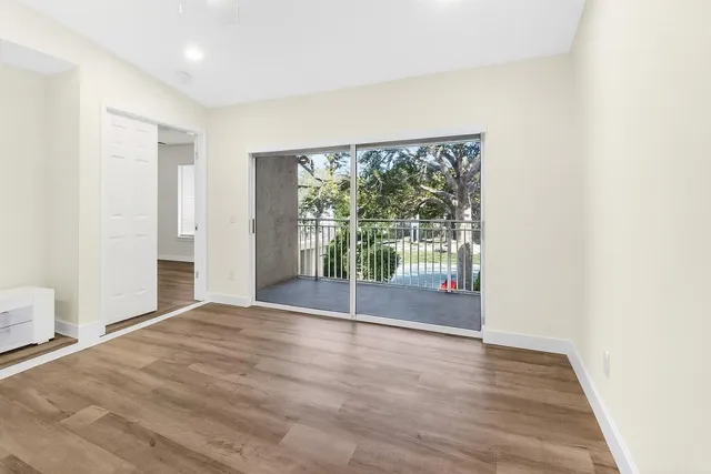 a bathroom with a toilet a sink and a mirror