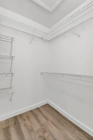 a view of a room with racks on the wall