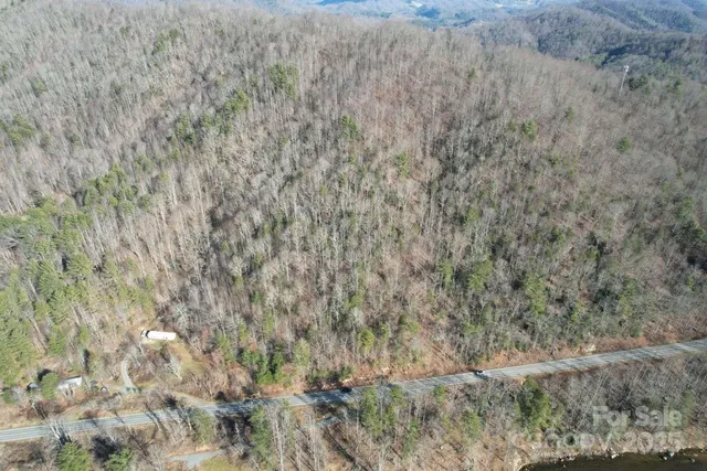 a view of a dry space with lots of bushes