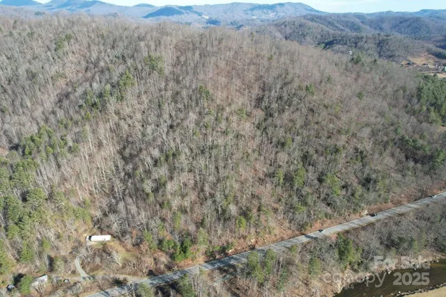 a view of a dry space with lots of bushes