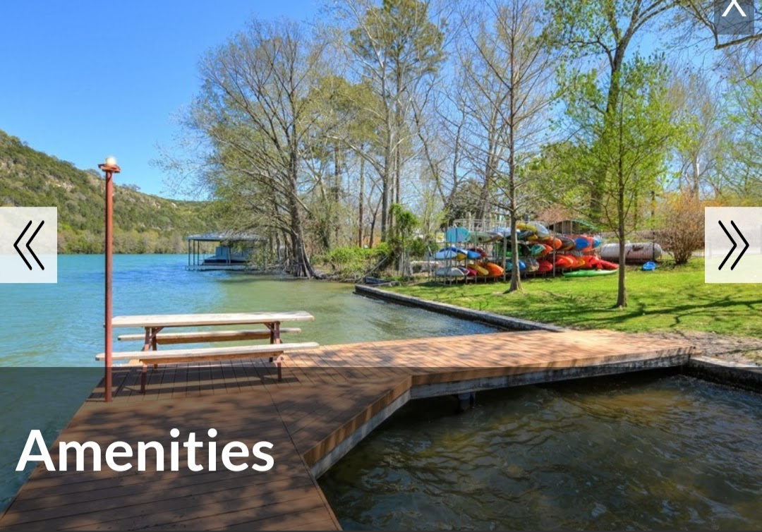 1301 Lipan Trail Austin, TX 78733 - Photo 33 of 39 Dock with a lawn and a water view