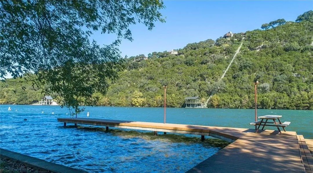 1301 Lipan Trail Austin, TX 78733 - Photo 38 of 39 Dock area with a forest view and a water view