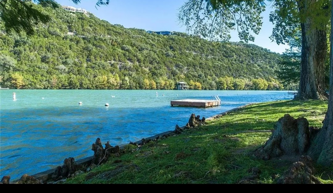 1301 Lipan Trail Austin, TX 78733 - Photo 39 of 39 Dock area with a forest view and a water view