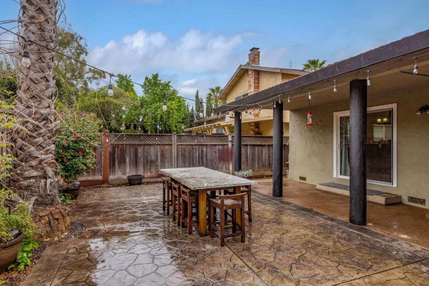 843 Ramona Way Gilroy, CA 95020 - Photo 24 of 26 a view of a dinning table and chairs in patio