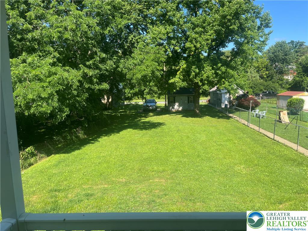 1839 Willow Park Road Bethlehem, PA 18020 - Photo 31 of 35 A verdant backyard with mature trees and practical outbuildings awaits your personal touch.