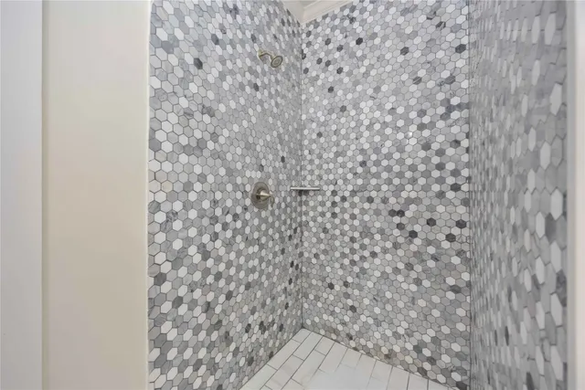 a bathroom with a shower curtain