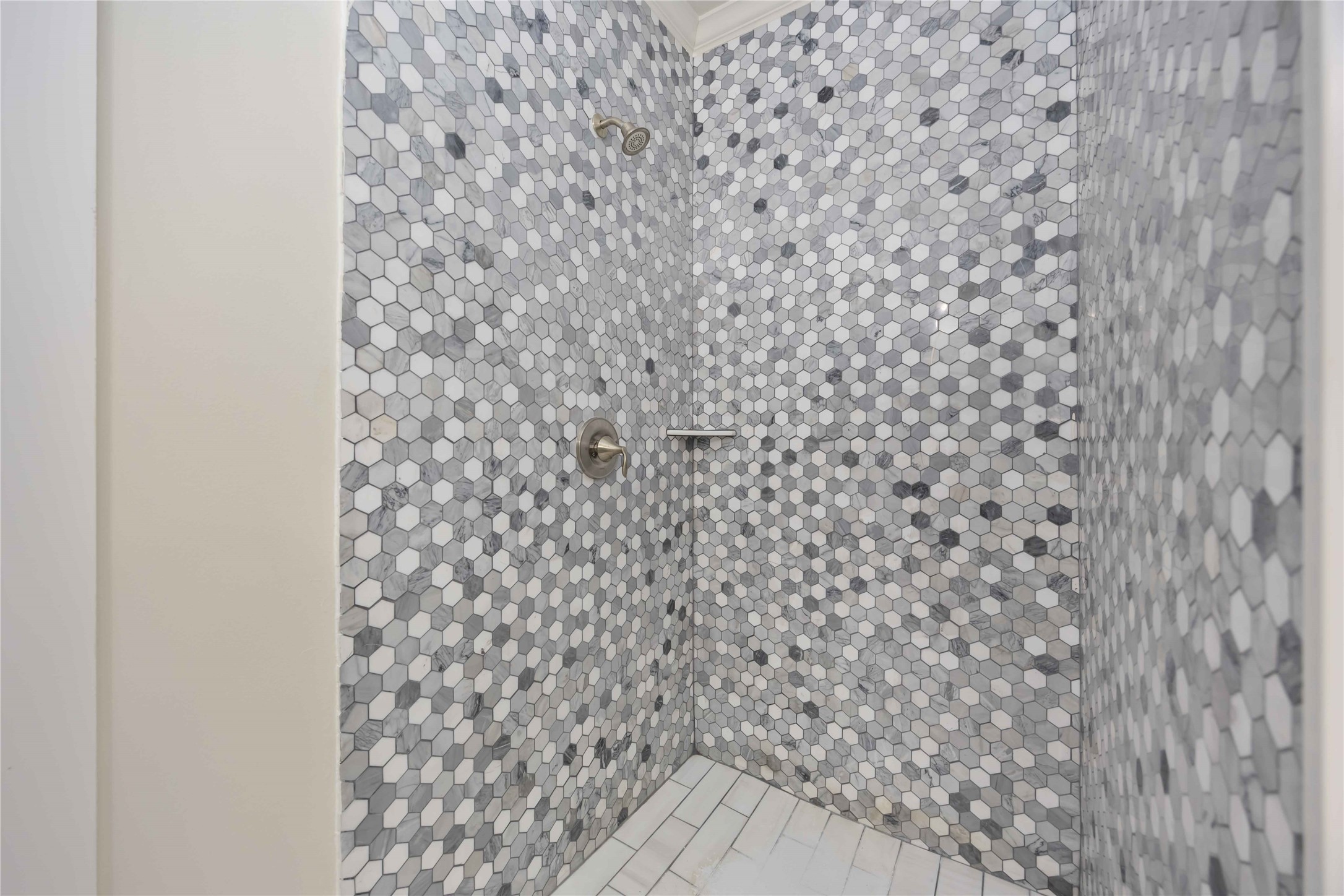 2708 Sam Wilson Street Houston, TX 77020 - Photo 13 of 18 a bathroom with a shower curtain