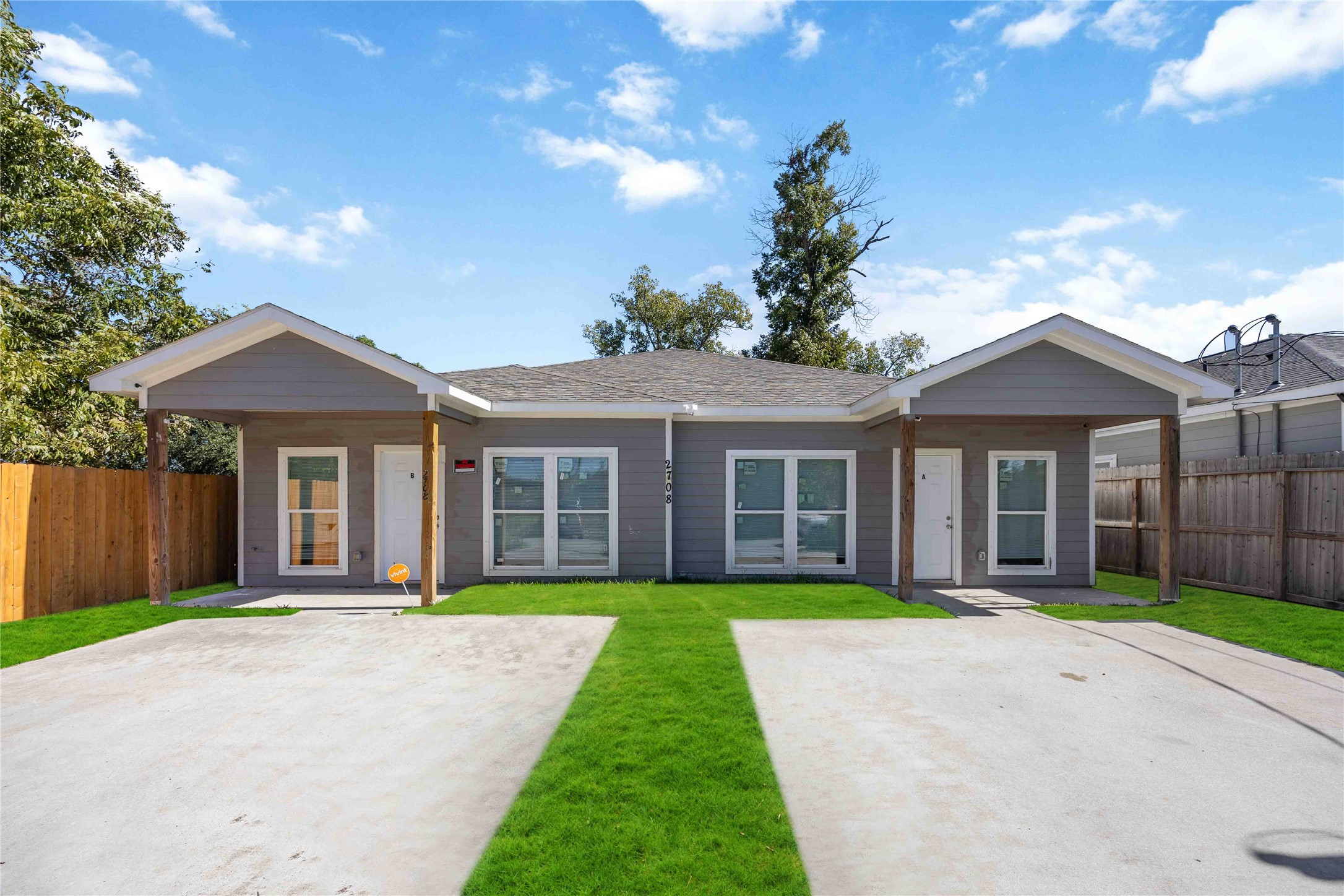 2708 Sam Wilson Street Houston, TX 77020 - Photo 2 of 18 a front view of a house with a yard and potted plants