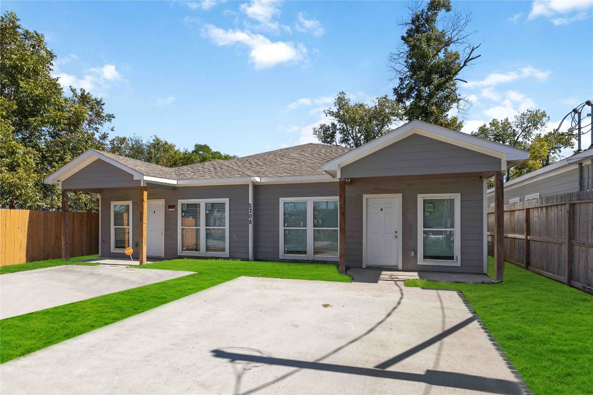 2708 Sam Wilson Street Houston, TX 77020 - Photo 3 of 18 a front view of a house with a yard and porch