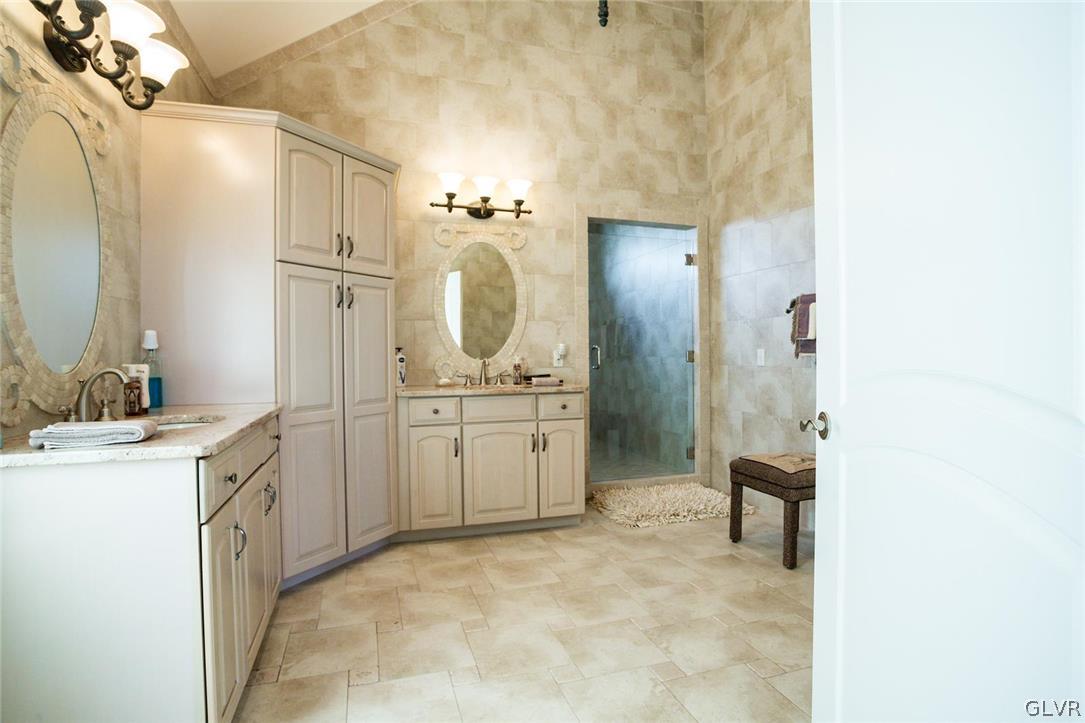 433 Little Creek Drive Nazareth, PA 18064 - Photo 11 of 44 a bathroom with a sink a toilet and shower