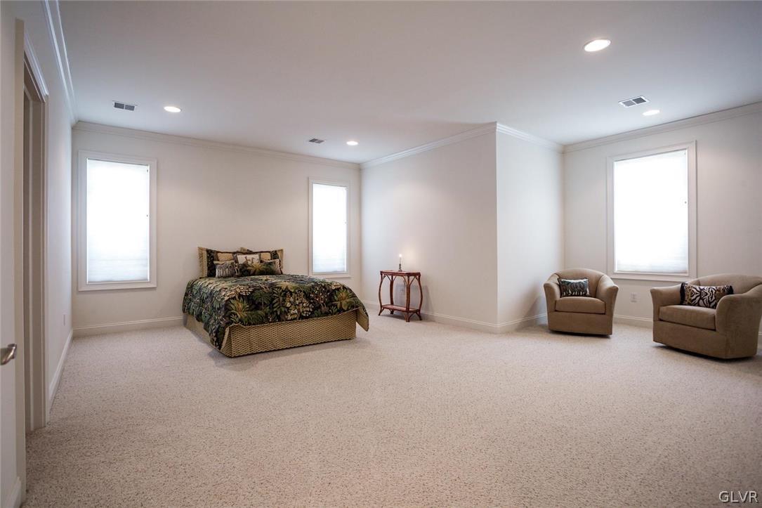 433 Little Creek Drive Nazareth, PA 18064 - Photo 17 of 44 a bedroom with a bed and a couch