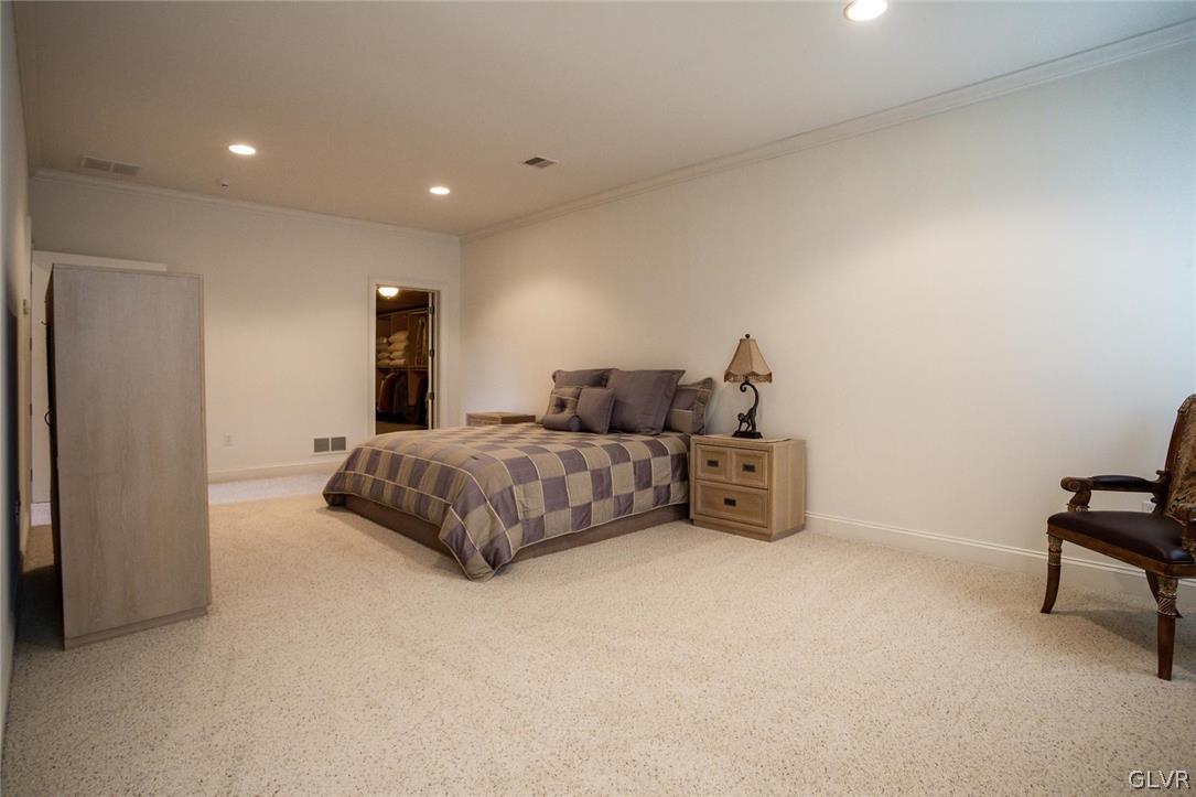 433 Little Creek Drive Nazareth, PA 18064 - Photo 21 of 44 a bedroom with a bed and a chair