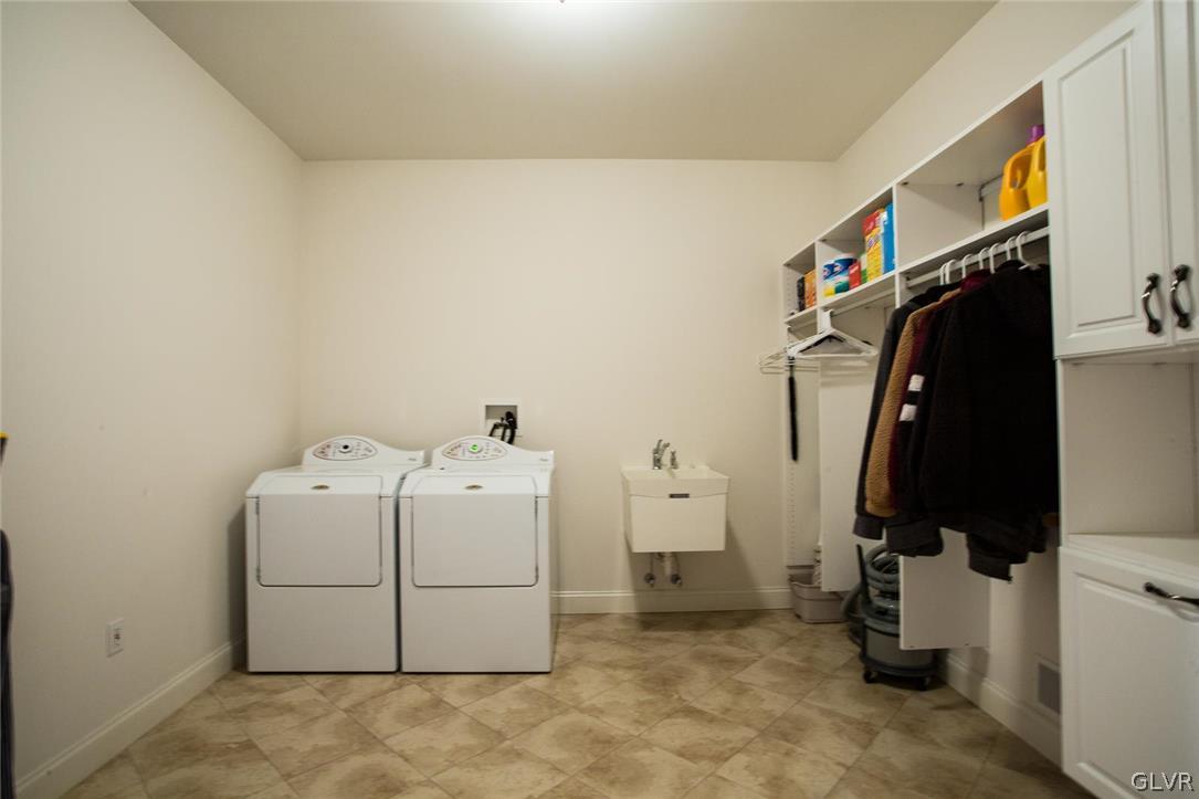 433 Little Creek Drive Nazareth, PA 18064 - Photo 26 of 44 a utility room with dryer and washer