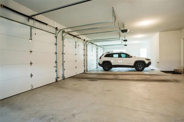 a view of a swimming pool with a lounge chair