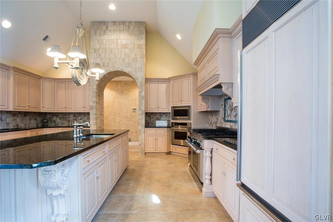 433 Little Creek Drive Nazareth, PA 18064 - Photo 3 of 44 a large kitchen with stainless steel appliances granite countertop a sink and cabinets