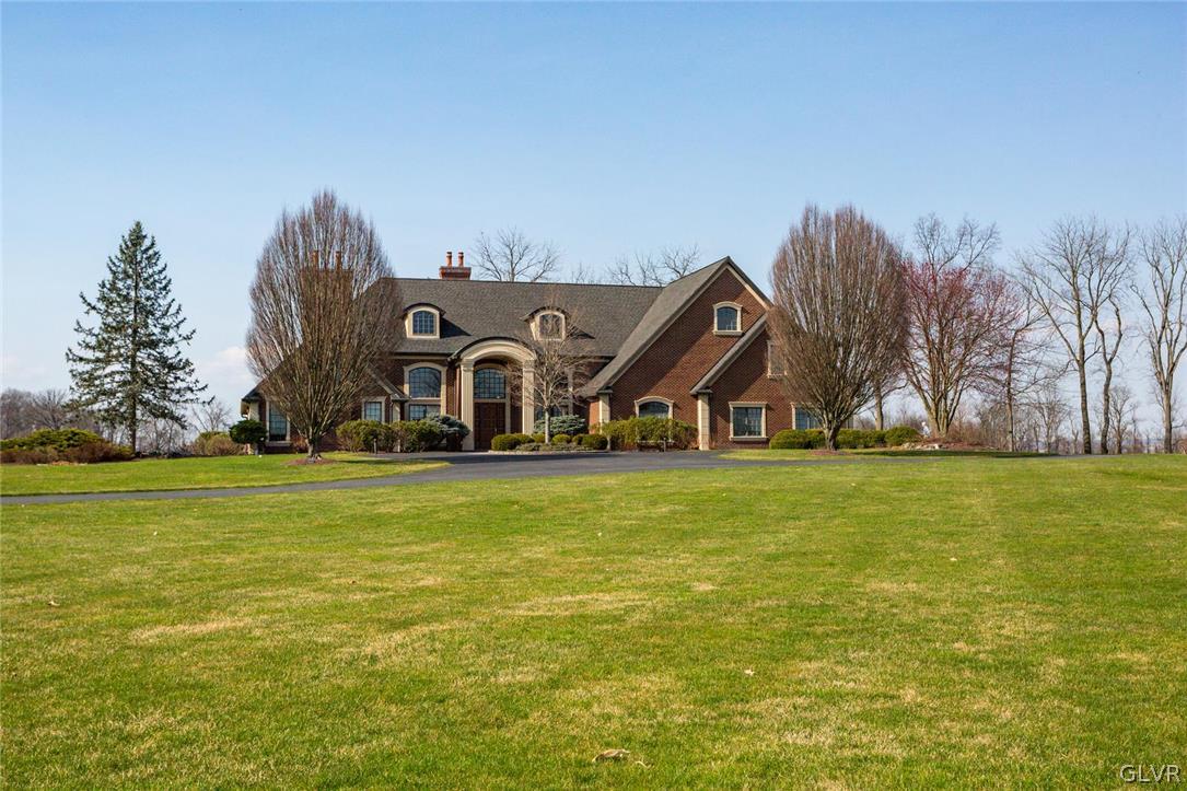 433 Little Creek Drive Nazareth, PA 18064 - Photo 40 of 44 a front view of the house with garden