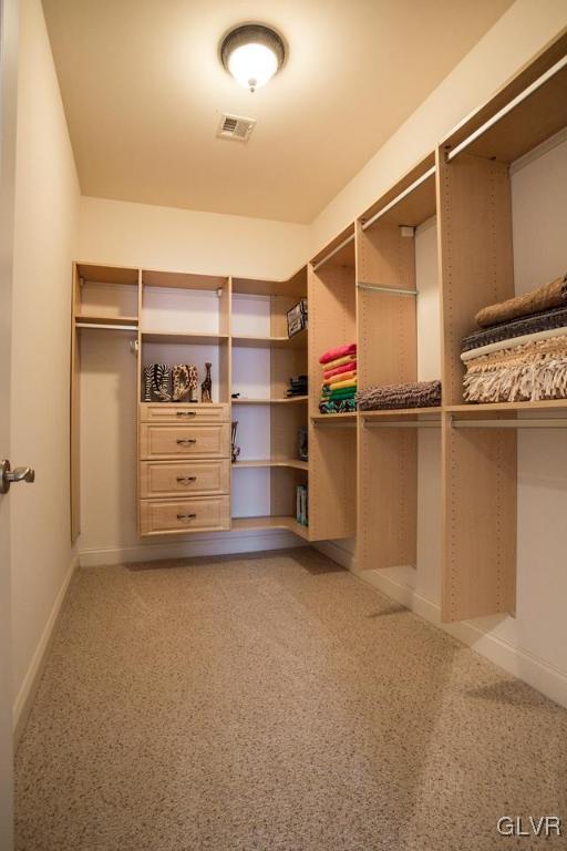 433 Little Creek Drive Nazareth, PA 18064 - Photo 7 of 44 a view of an empty room with racks on the wall