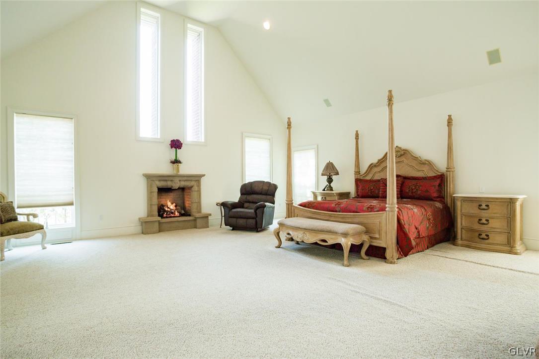 433 Little Creek Drive Nazareth, PA 18064 - Photo 9 of 44 a living room with furniture and a fireplace