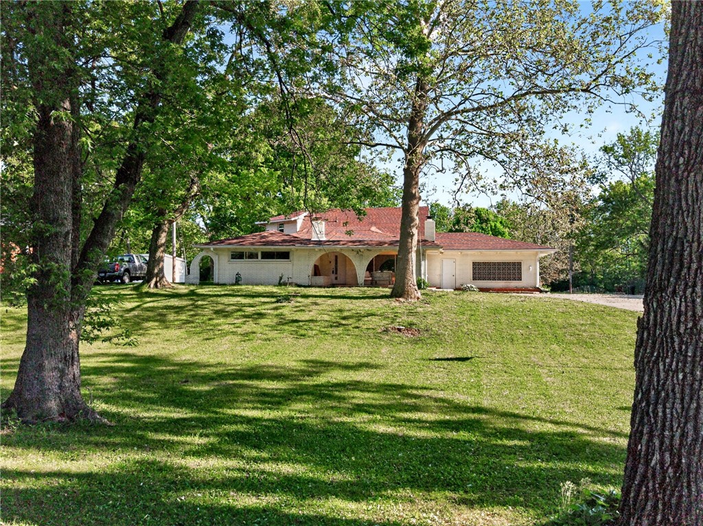 2684 Arthur Road Springfield, OH 45502 - Photo 42 of 69 This charming home features a classic exterior and a spacious yard, offering a tranquil retreat.