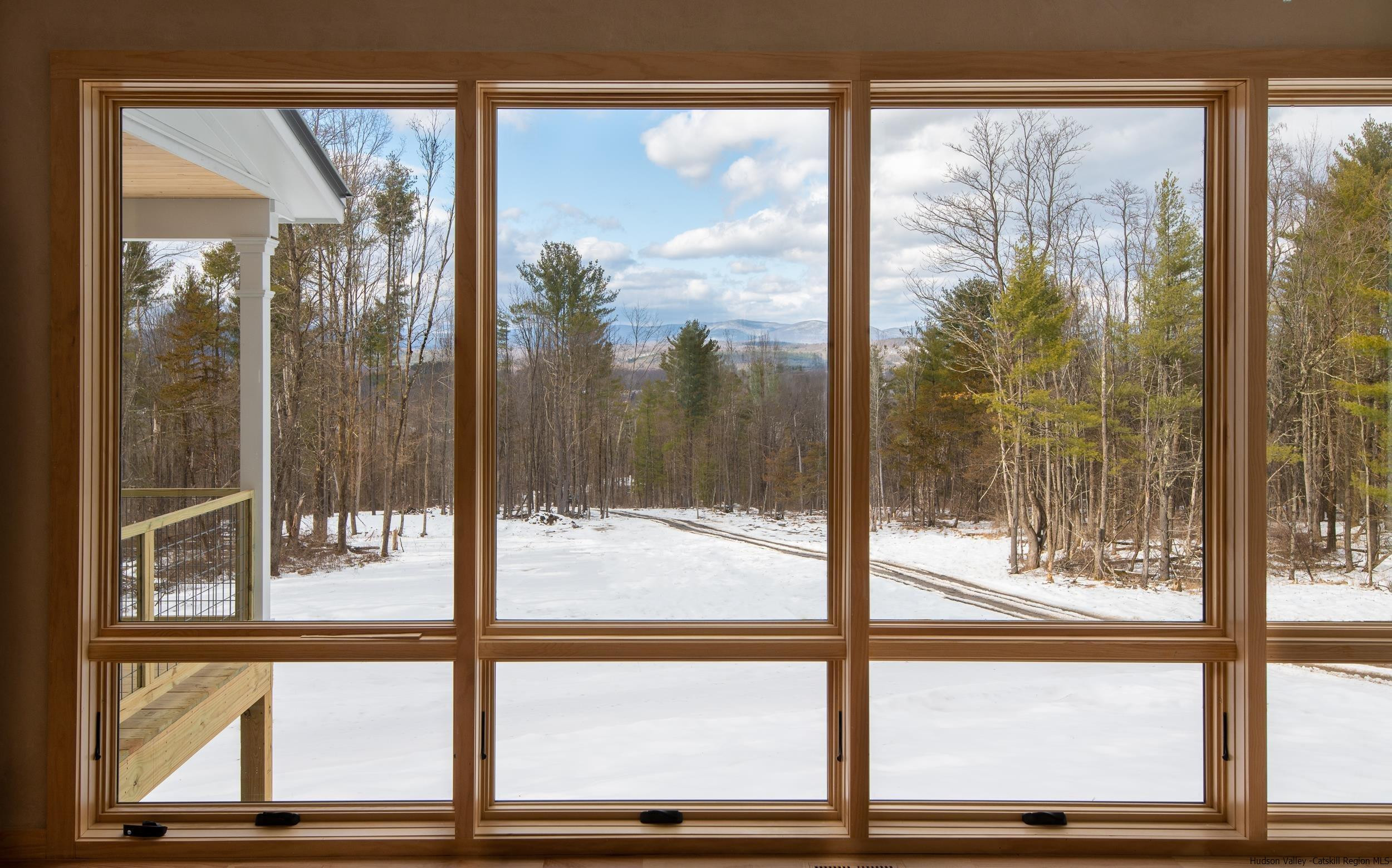 1622 Berme Road Kerhonkson, NY 12446 - Photo 13 of 33 a view of a glass door with a tree