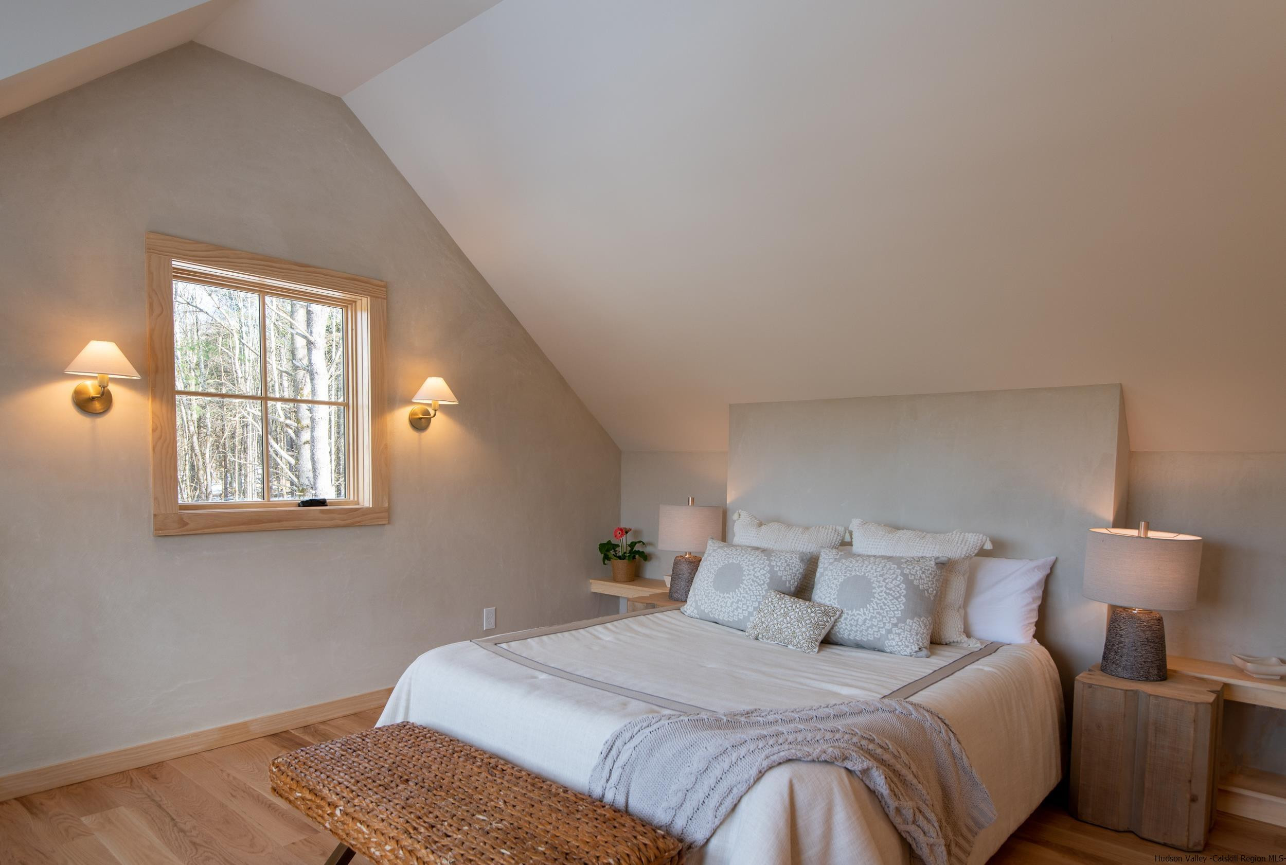 1622 Berme Road Kerhonkson, NY 12446 - Photo 20 of 33 a bedroom with a bed and a window