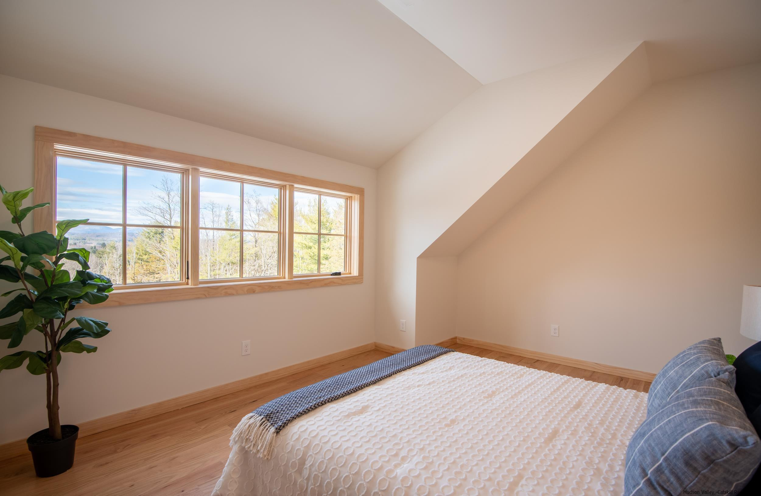 1622 Berme Road Kerhonkson, NY 12446 - Photo 26 of 33 a bedroom with a bed and a window
