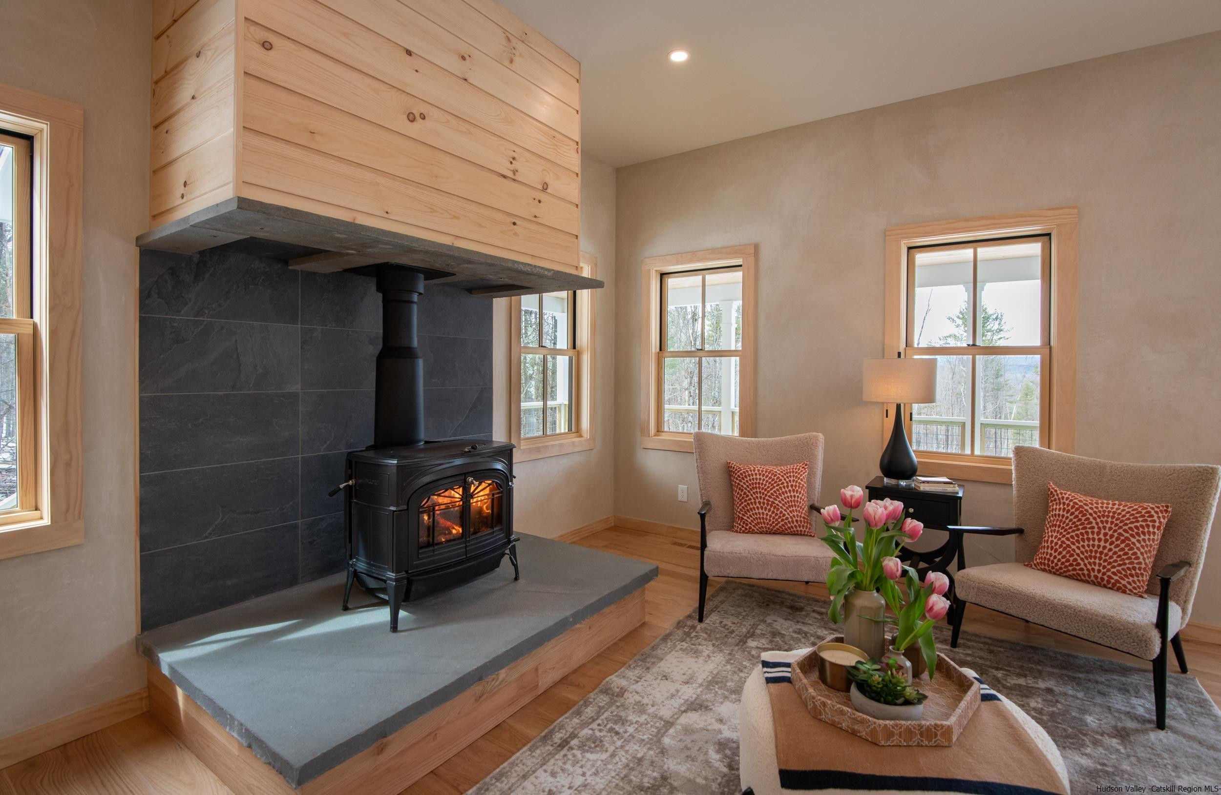 1622 Berme Road Kerhonkson, NY 12446 - Photo 7 of 33 a living room with furniture a window and a fireplace