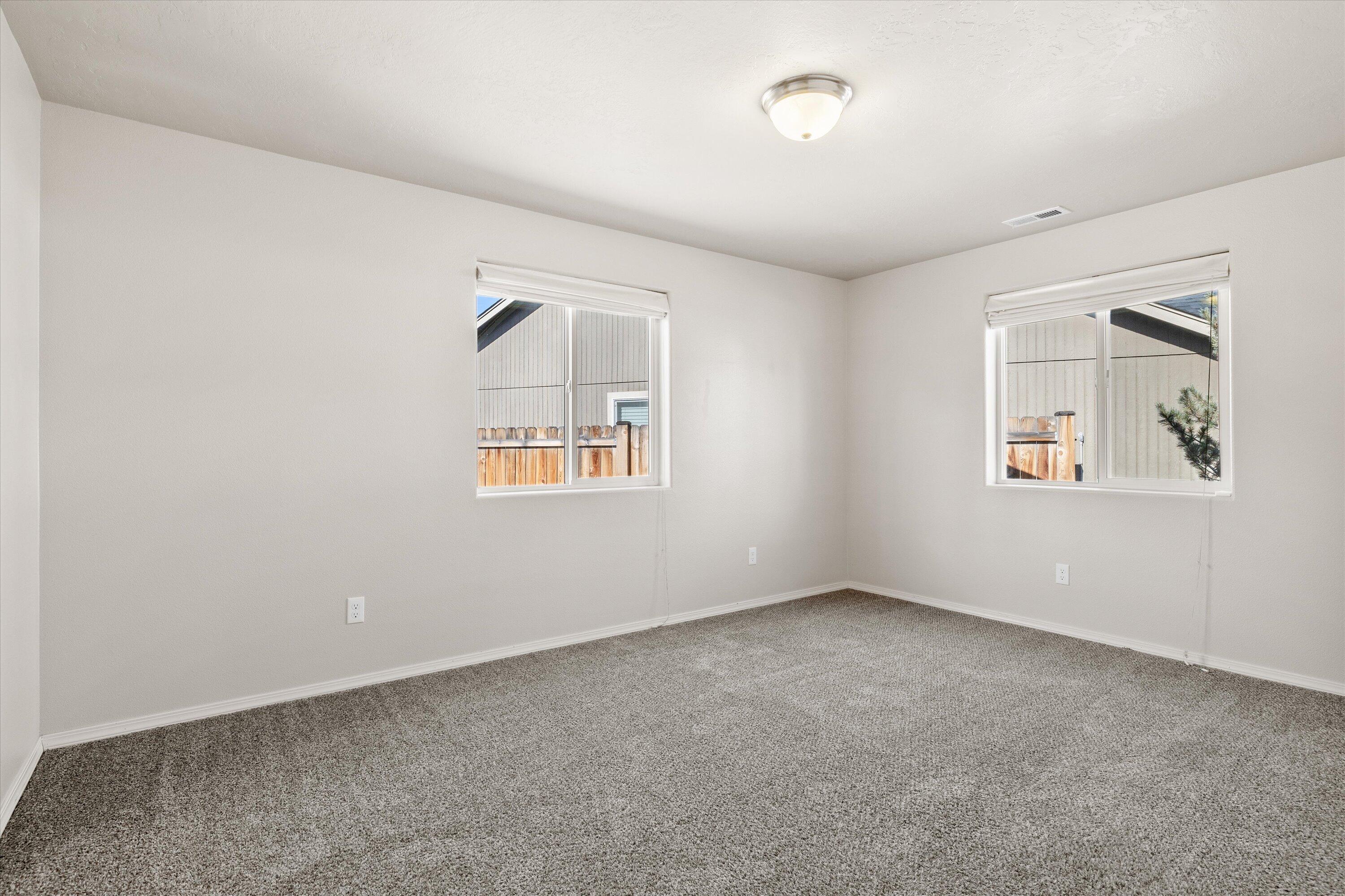 61803 Southeast Rolo Court Bend, OR 97702 - Photo 14 of 23 Primary Bedroom