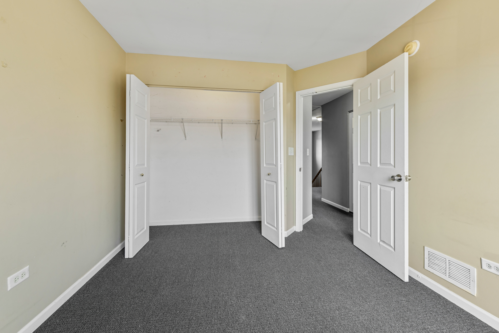 10233 Concord Lane, Unit C Bridgeview, IL 60455 - Photo 10 of 20 an empty room with closet and a hallway