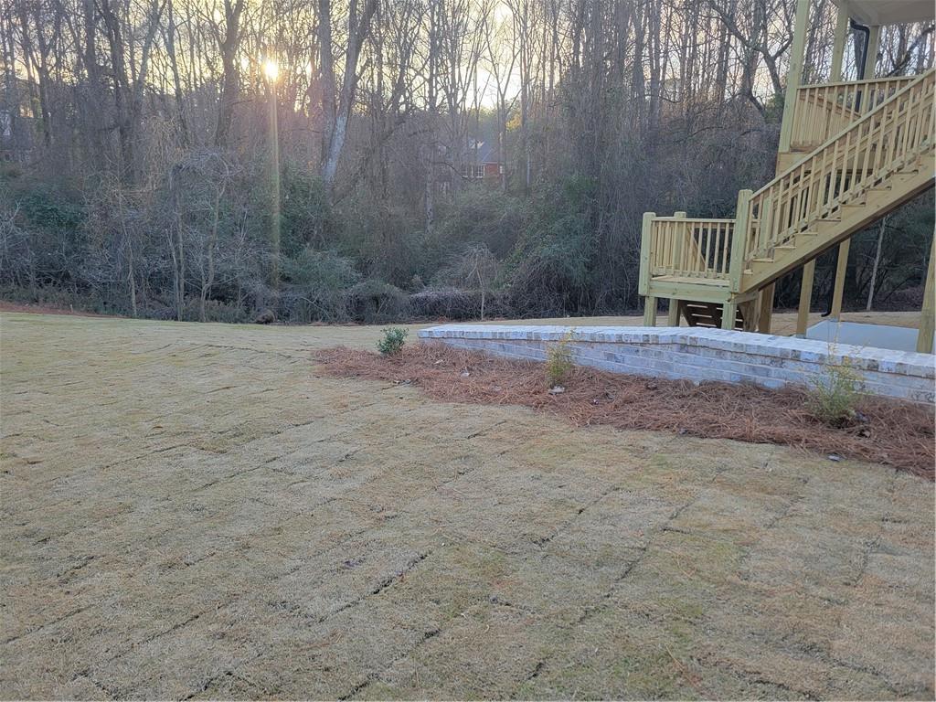 4795 Fairways Lane Jefferson, GA 30549 - Photo 18 of 20 a view of an house with backyard and trees