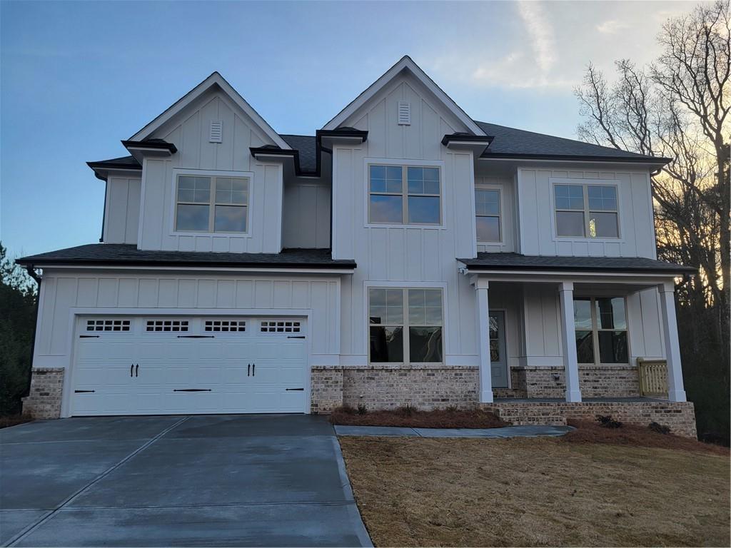 4795 Fairways Lane Jefferson, GA 30549 - Photo 2 of 20 a view of a white house with large windows