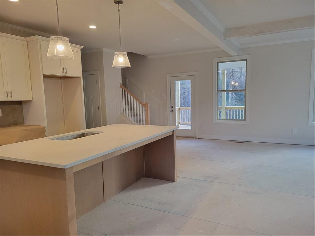 4795 Fairways Lane Jefferson, GA 30549 - Photo 5 of 20 a view of a kitchen with a sink and chandelier