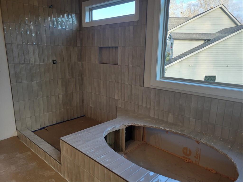 4795 Fairways Lane Jefferson, GA 30549 - Photo 10 of 20 a bathroom with a sink a toilet and shower