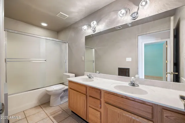 a room with patio outer view and glass door