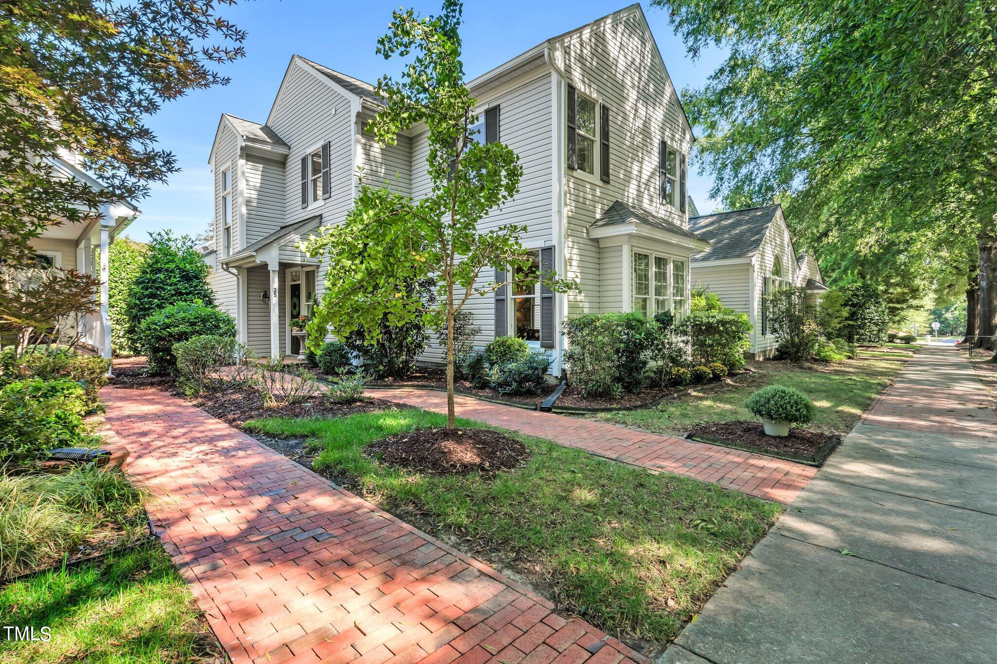 25 East Camden Pittsboro, NC 27312 - Photo 1 of 71 a front view of a house with garden