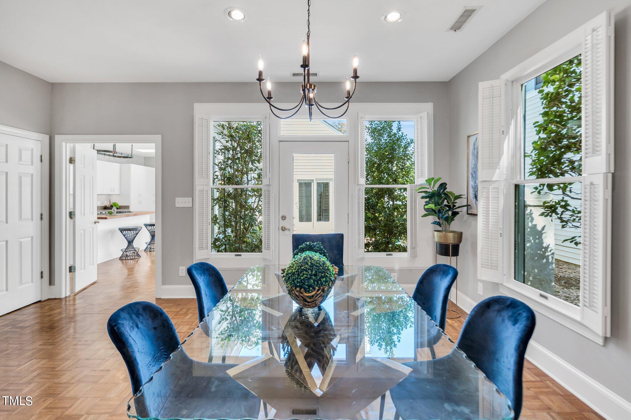 25 East Camden Pittsboro, NC 27312 - Photo 15 of 71 a view of a dining room with furniture window and wooden floor