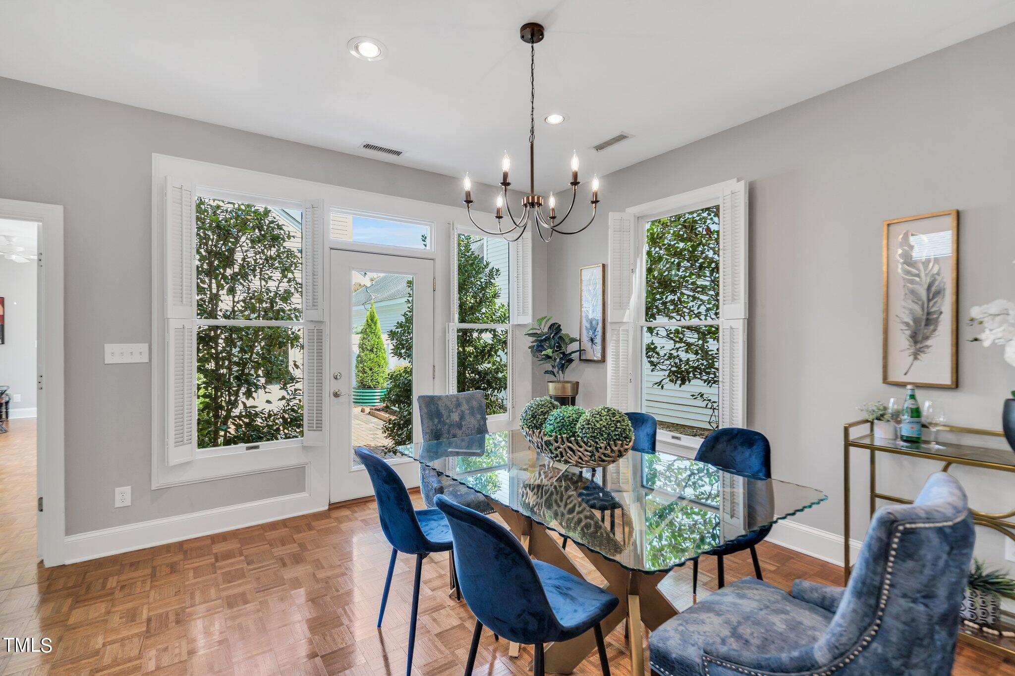 25 East Camden Pittsboro, NC 27312 - Photo 16 of 71 a view of a dining room with furniture window and outside view